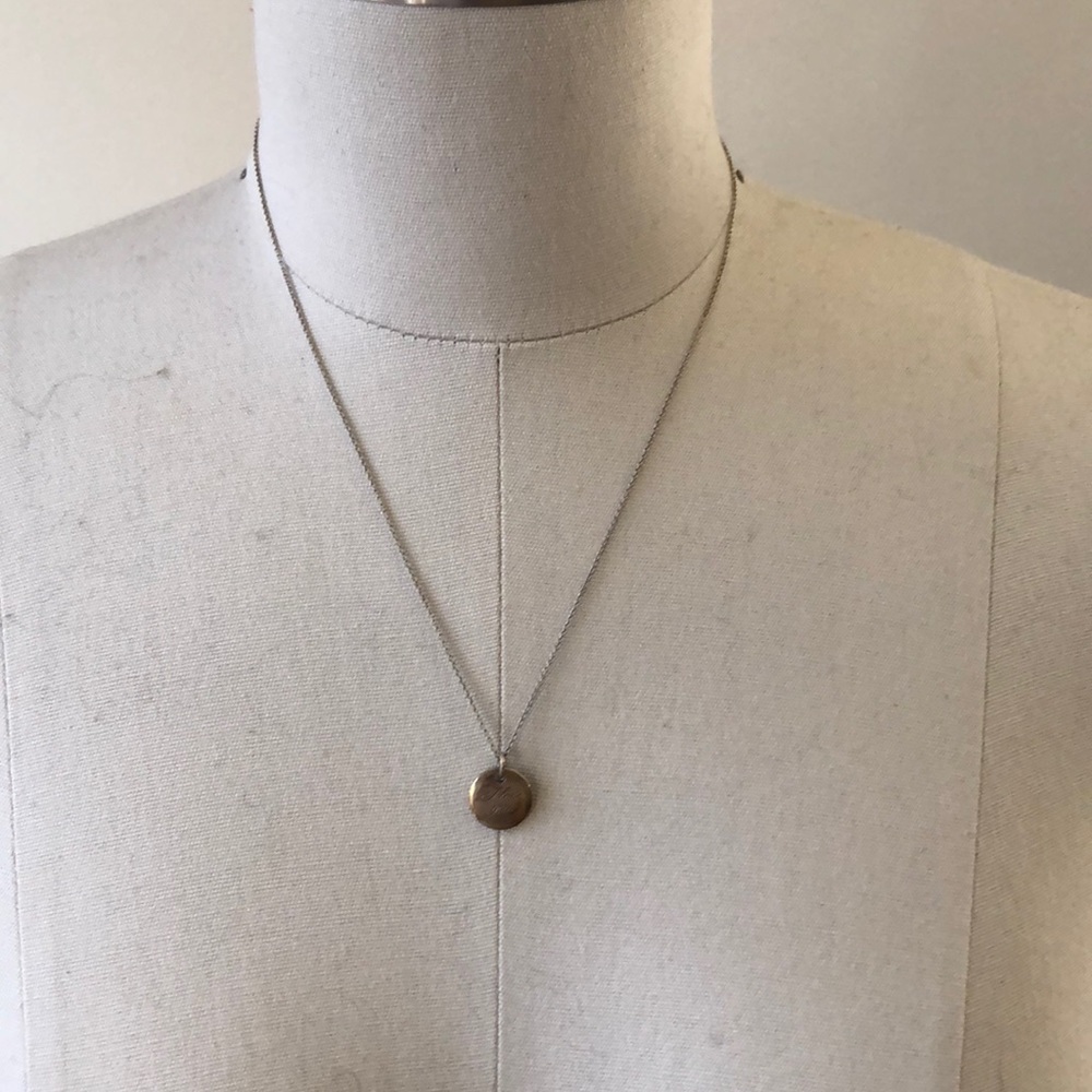 Tiffany & Co. “I love you” pendant necklace